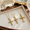 Stainless steel diamond heart-shaped three-dimensional cross necklace, a versatile and fashionable daily commuting pendant necklace details Picture